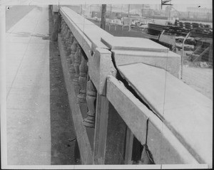 Crumbling concrete rail of the Ninth Street bridge