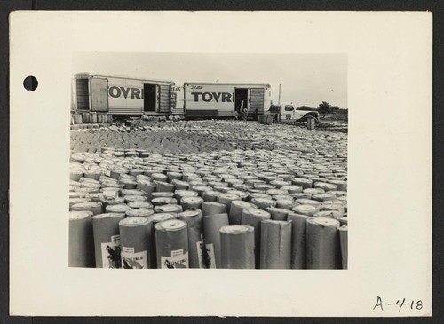 Poston, Arizona--Roofing material which will be used in the construction of living quarters for evacuees of Japanese ancestry at the Colorado River War Relocation center. Photographer: Clark, Fred Poston, Arizona