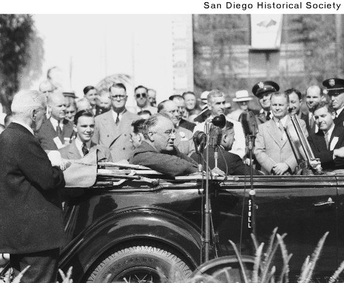 President Franklin Roosevelt seated in an automobile during the dedication of the County Administration Building