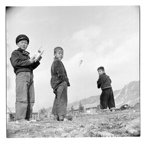 Boys flying kites in South Korea, 1956/1959