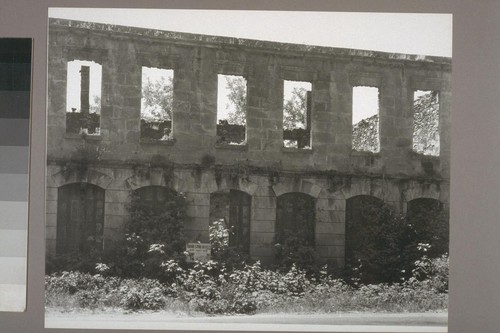 [Ruins of bank, store and office building.] El Dorado. 1947