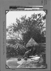 Woman grinding corn, Nyasa, Tanzania, ca.1898-1914