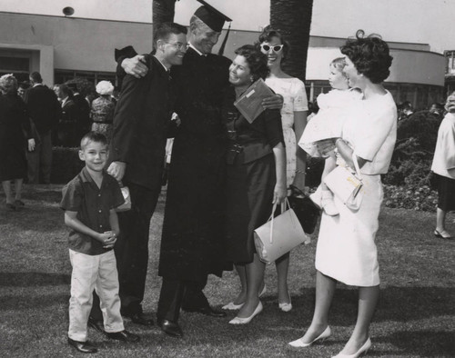Pepperdine College graduate celebrates with family, 1962