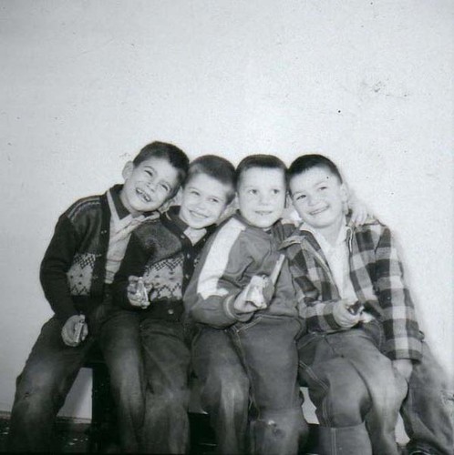 Four boys with toy guns