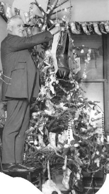 [Matthew Brady, San Francisco District Attorney, with Christmas tree]