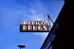 Medico Drugs sign located on the east side of North Main Street in Sebastopol, California, 1977