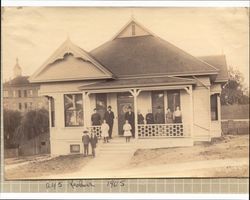 Ira and Minnie Raymond with their family standing on the porch of their newly constructed home at 245 Keokuk Street, Petaluma , 1905