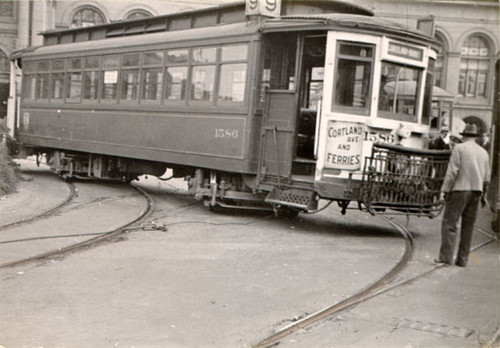 [Scene of a streetcar accident in front of the Ferry Building]