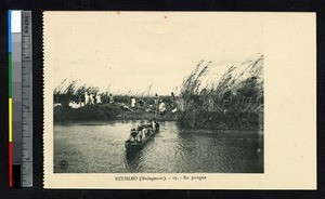 Six Betsileo men in a canoe, Madagascar, ca.1900-1930