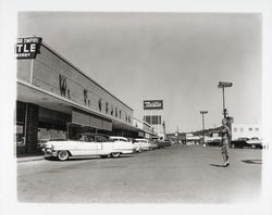 Barb Neeley in front of W.T. Grant Co. in Montgomery Village, Santa Rosa, California, 1959