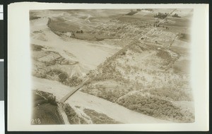 Aerial view of flooding near the Riverside Bridge and airport, ca.1930