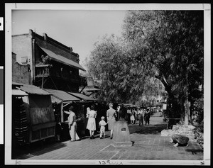 Olvera Street, showing a monument, ca.1940-1949