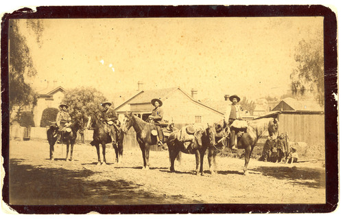 Four Men on Horseback