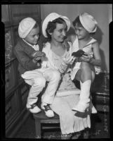 Mrs. Mary V. Squires with her children in a Small Claims court, Los Angeles, 1935