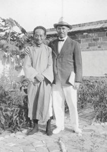 Rector Kuo ch'eng Ch'uan and missionary Jens P. Bjergaarde, August 1932