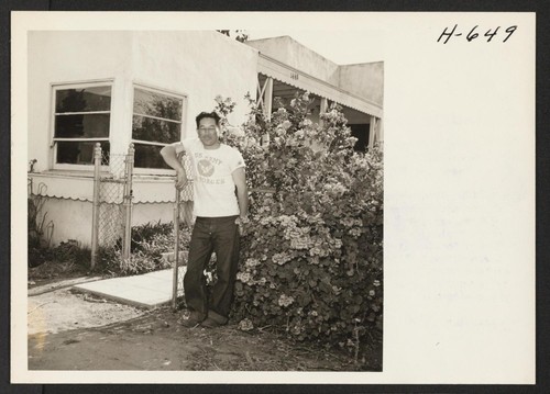 James Kobata, from Rohwer, returns to his flower nursery on 139th St., Gardena, California. His wife and children remain in