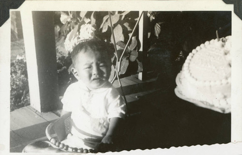 [Baby and cake]