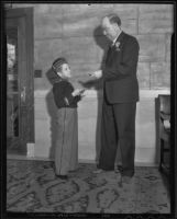 Elmer Spangler, Biltmore Hotel page, and William Jones, Biltmore Hotel guest, Los Angeles, 1935