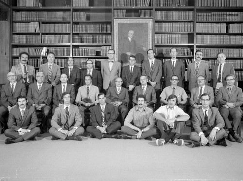 Group portrait of Mount Wilson and Hale Observatories research staff and staff associates at the Hale Library, Pasadena