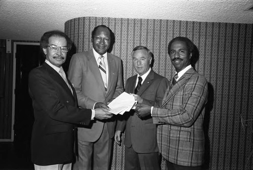 Tom Bradley posing with Don Bohana and others, Los Angeles
