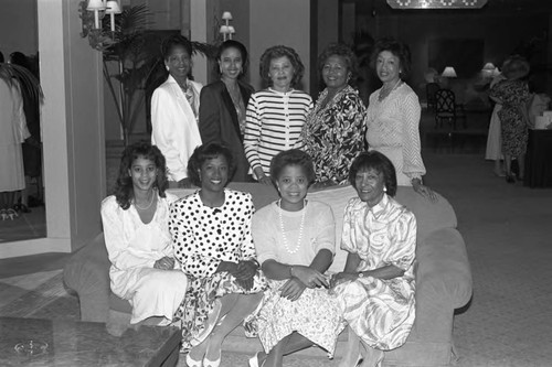 Alpha Kappa Alpha sorority sisters posing together at a luncheon, Los Angeles, 1989