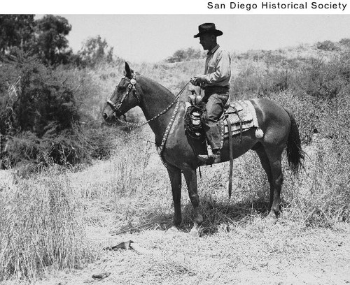 A man on horseback in Balboa Park during the 1935 Exposition