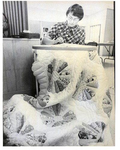 Margaret Plagmann working on a section of a quilt