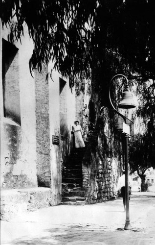 Staircase to choir loft and bell marker of Mission San Gabriel Arcangel