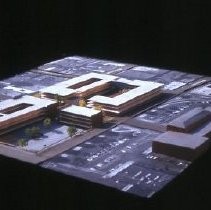 Views of redevelopment sites, renderings, and table models for the proposed Redevelopment District. Includes maps and site plans. This view shows a table model