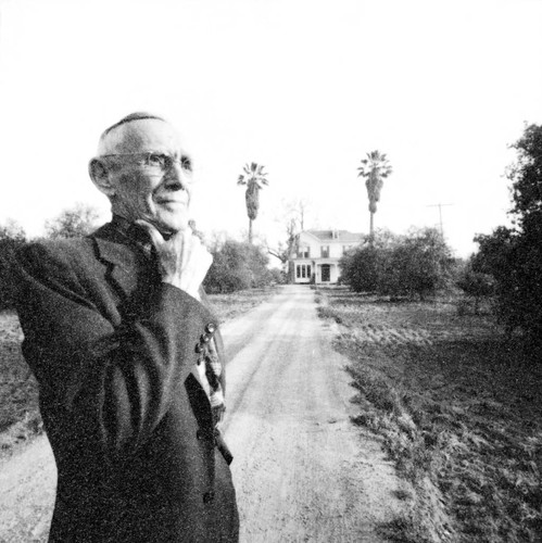 Lucius Allen in front of his family home, West Main Street at Tustin Avenue