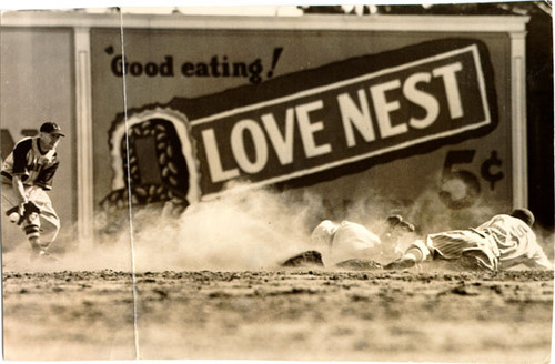 [Seals player stealing second base during a game between San Francisco and Los Angeles]