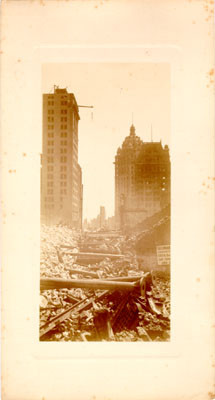 [View of ruins along Kearny Street looking south from Sutter, showing the Chronicle, Call and Mutual Savings Bank buildings]