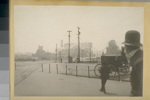 [Clouds of smoke or dust on Market Street, possibly during demolition of ruins.]
