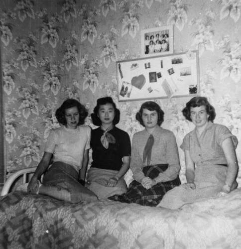College women in dormitory room