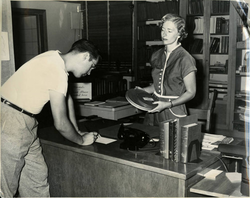 1951, Old Post Office building, Peggy McDaniel and patron
