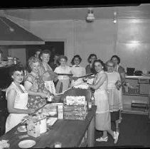 A group of women preparing food