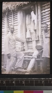 An evangelist at the church door, Benin, ca. 1925-26