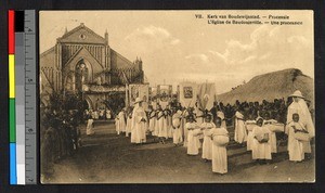 Religious procession before a large stone church, Congo, ca.1920-1940