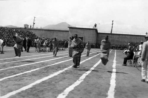 Sack race, San Quentin Little Olympics Field Meet, 1930 [photograph]
