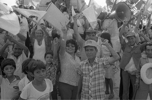 Crowd cheering at political rally, San Salvador, 1982