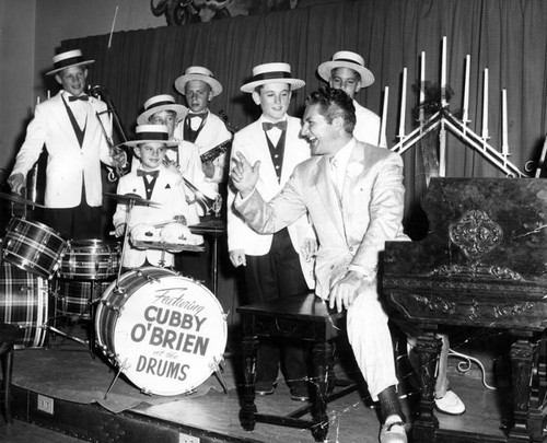 Liberace and Dixieland youth band