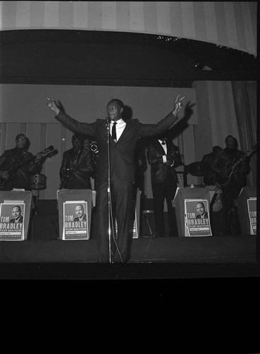 Tom Bradley posing on stage during his mayoral campaign, Los Angeles, 1973