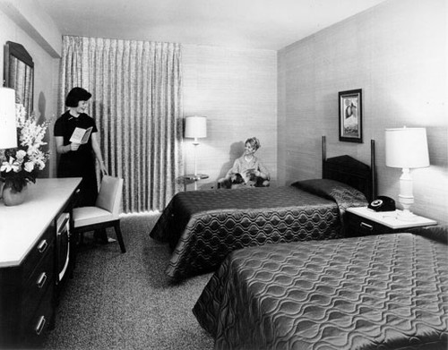 [Guest room with twin beds inside the San Francisco Hilton]