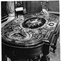 Inlaid wood table inside Stanford Home