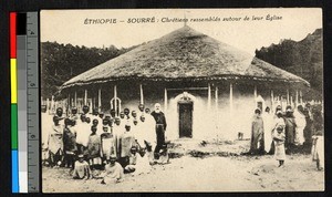 Missionary father with others gathered outside a church, Ethiopia, ca.1920-1940