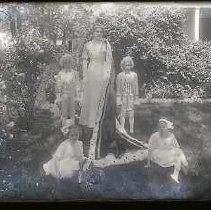Unknown Women with gown and attendees