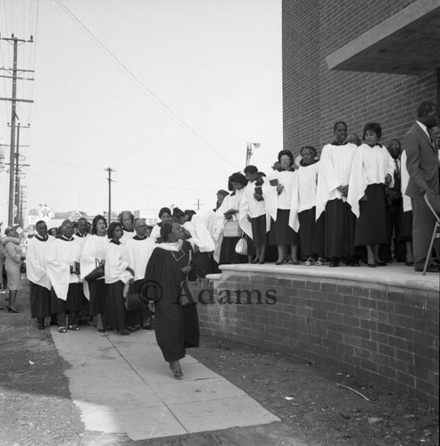 Trinity Baptist Church choir members entering church, Los Angeles, 1965