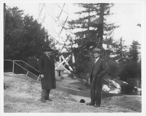 Albert Einstein and Charles St. John standing near the 150-foot tower telescope, Mount Wilson Observatory