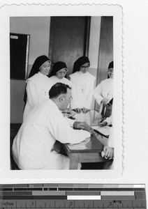 Fr. Smith with native Sisters at Jiangmen, China, 1948