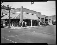 Unemployed men line up to register for work on San Pedro St., Los Angeles, 1929-1939